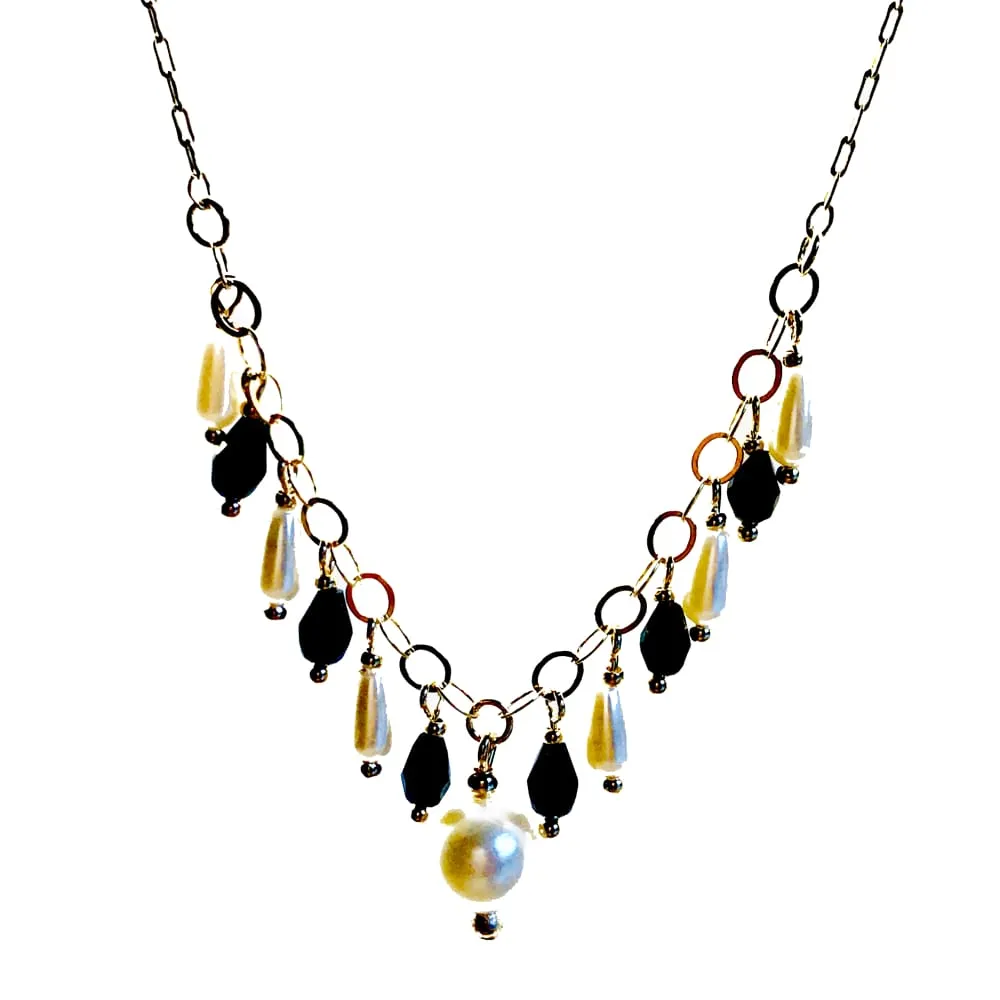 Black and white faux pearls 18kts of gold plated necklace