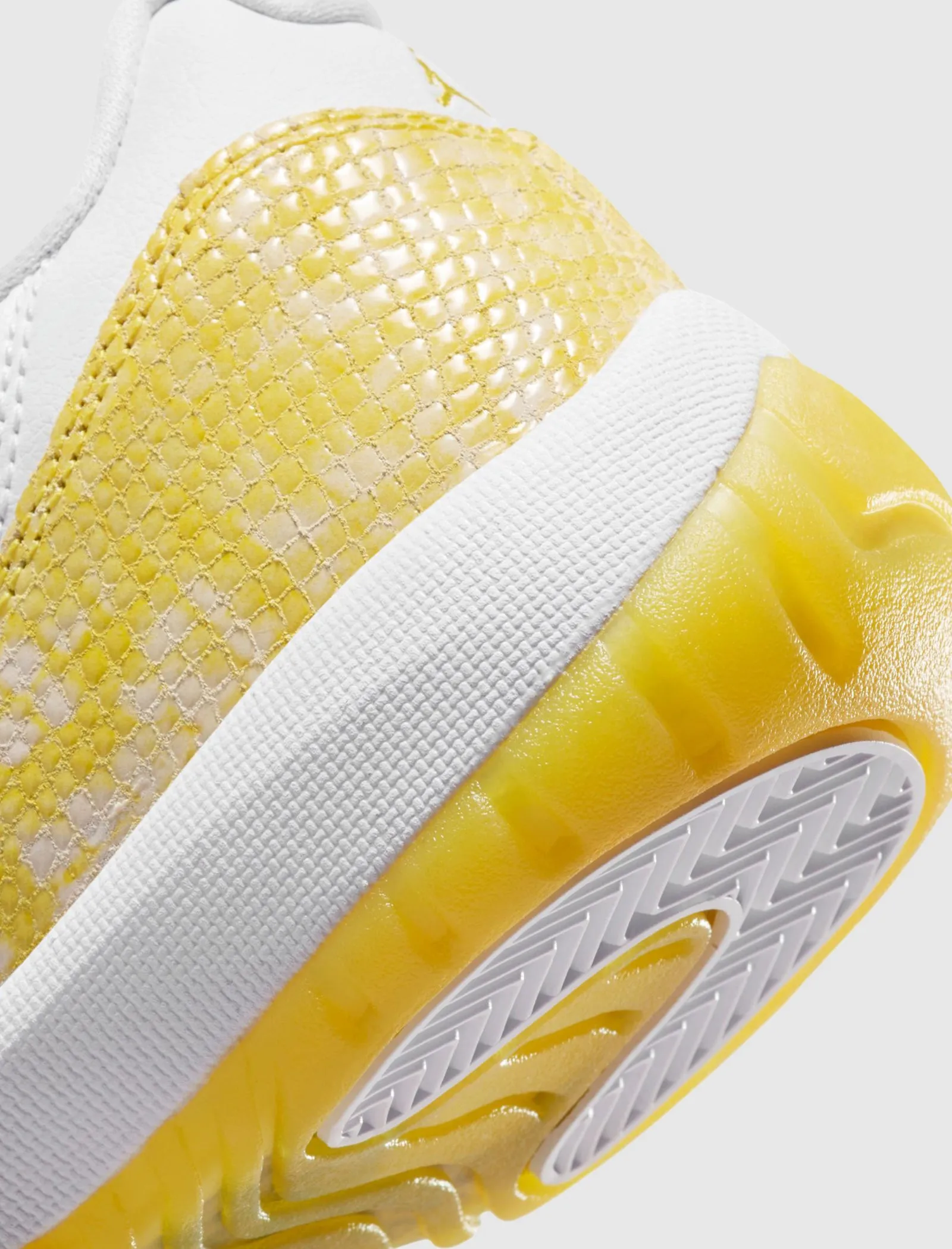 WOMEN'S AIR JORDAN 11 RETRO LOW YELLOW SNAKESKIN